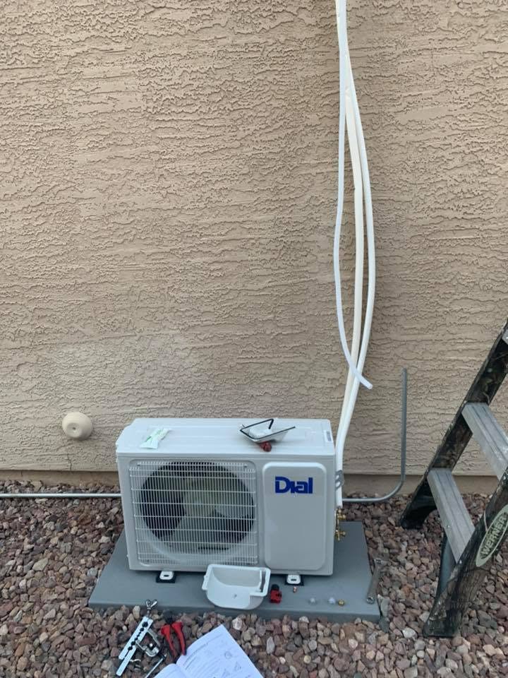 Stone AC — mini-split outdoor unit installation in progress