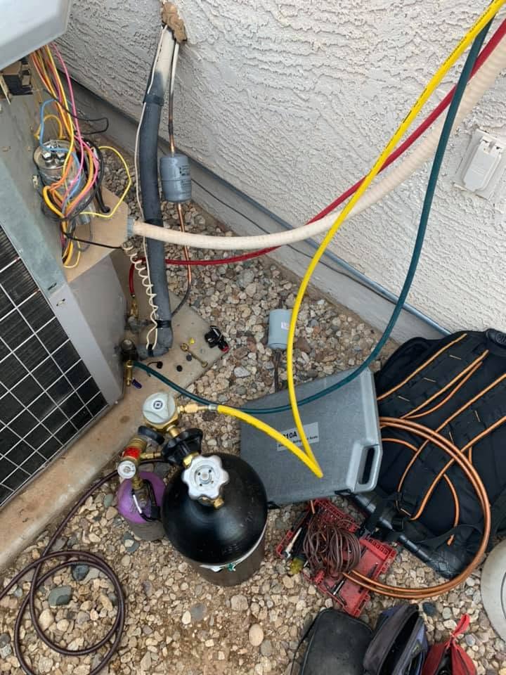 Stone AC — refrigerant service in progress